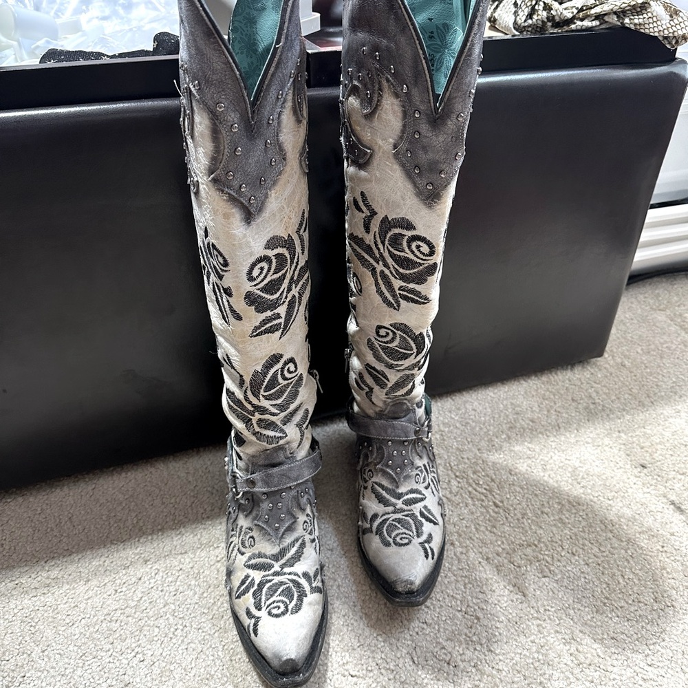 Corral rose embroidered boots.